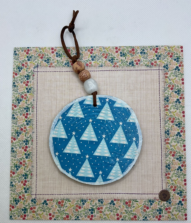 Handmade Christmas decorations. Hanging wooden decorations.