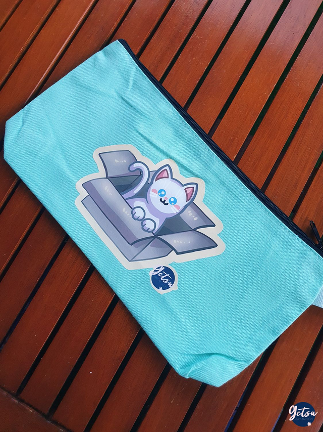 Trousse bleue chat blanc