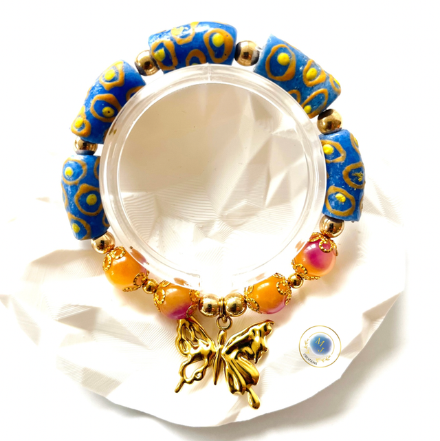 Flight of Change – Vlinder Armband met Handbeschilderde Kralen