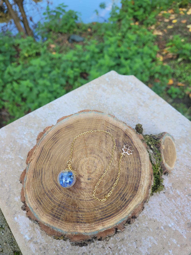 Pendule boule avec lapis lazuli couleur or