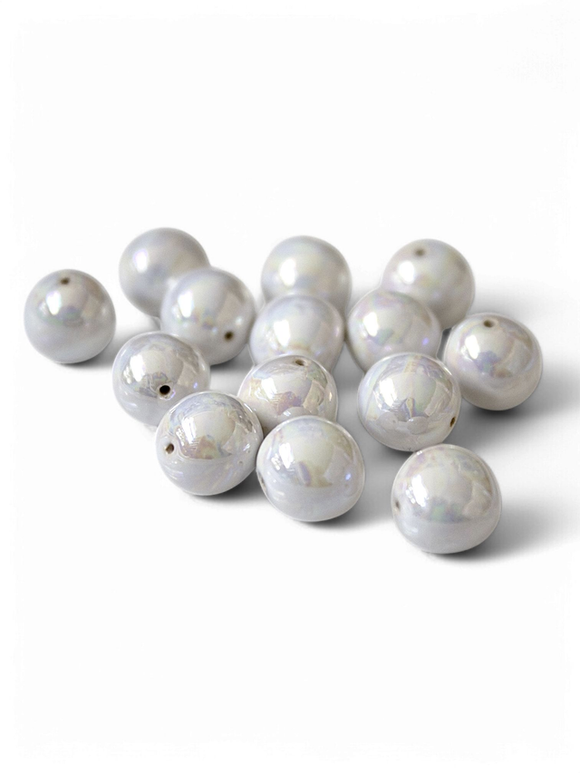 Perle de faïence banche nacrée, semi-ronde, 0,8-0,9 mm x 1 pc