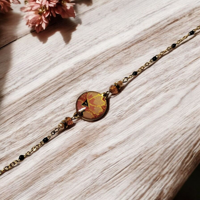 bracelet acier inoxydable motifs japonais corail noir et doré