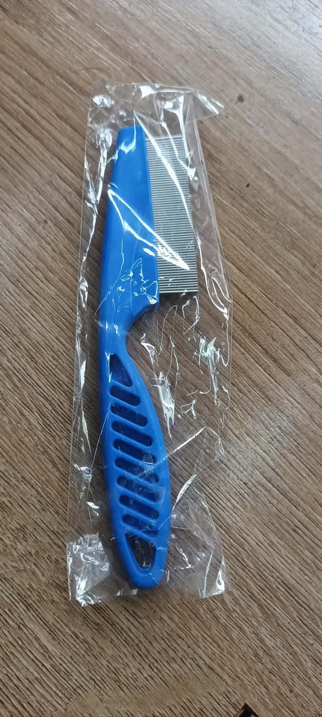Long handled flea comb 