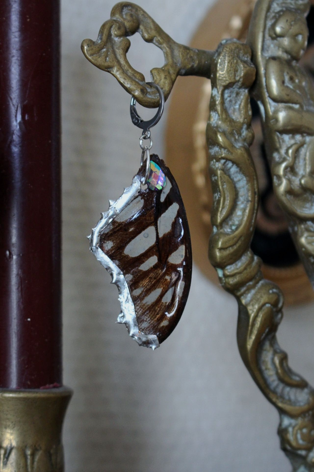 Monoboucle, spiky butterfly wings