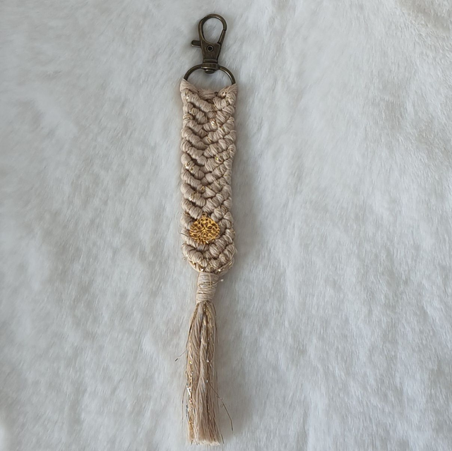 Porte-clés beige et brillant