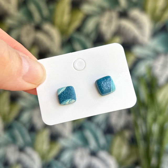 Small blue square studs