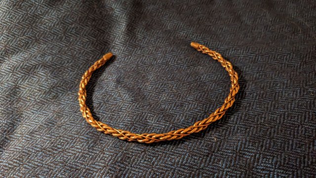 Small fancy copper torc