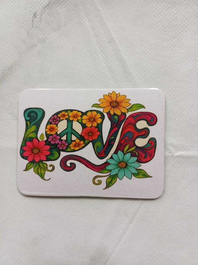 A set of seven assorted fridge magnets