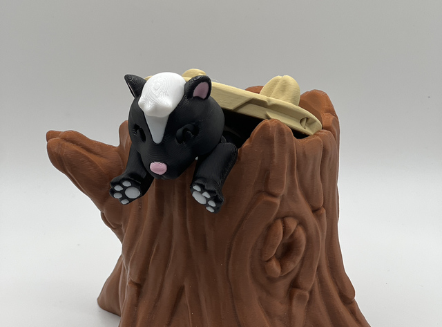 Skunk and tree stump