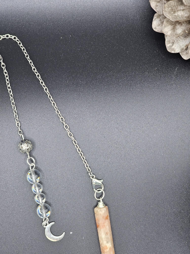 Pendule pierre de soleil + cristal de roche