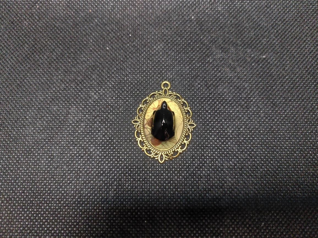 Pendentif tortue doré 