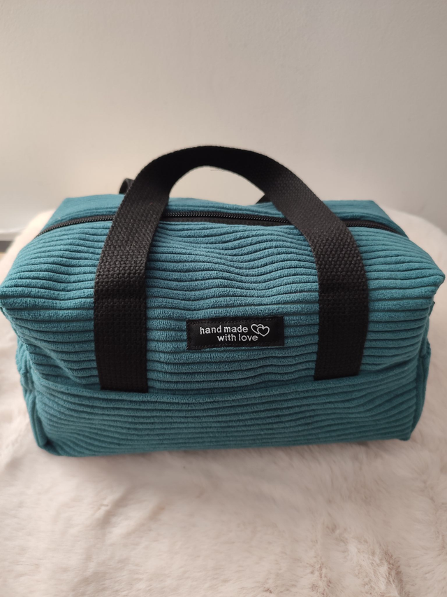 trousse de toilette bleue canard