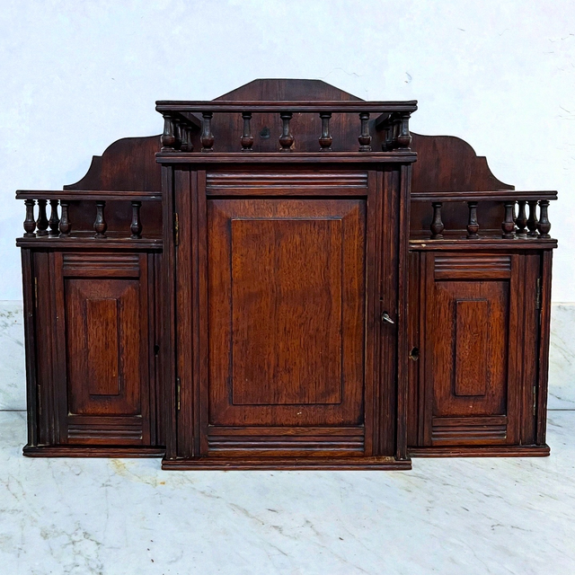 An Edwardian Three Door Smokers Table Cabinet With Gallery Top