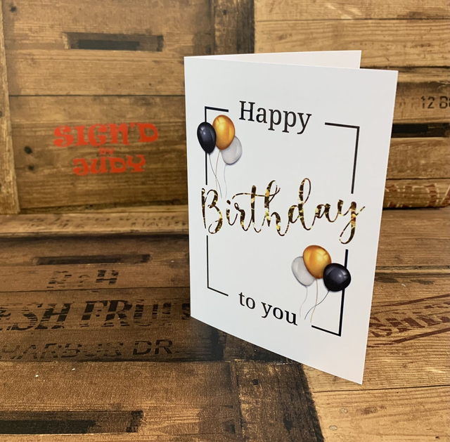 black and gold balloons birthday card