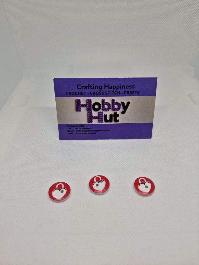 Red Buttons With White Heart Shaped Padlock