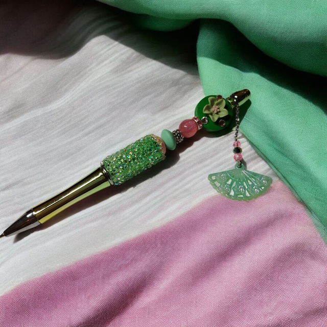 Stylo perles vert rose