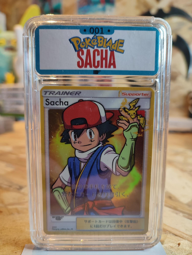 Carte custom pokéblade Sacha sous slab