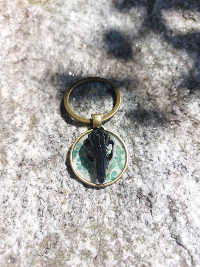 Porte clé crâne de renard vert