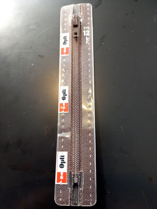 S40 / kleur 881 Opti rits kunststof donkerbruin