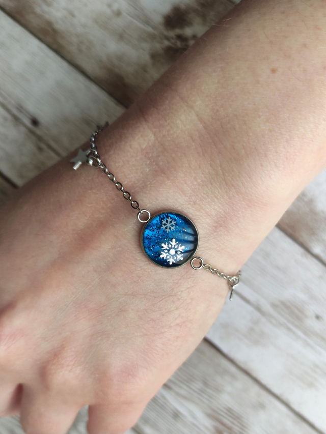 Bracelet acier inoxydable &quot;stars&quot; bleu et flocons