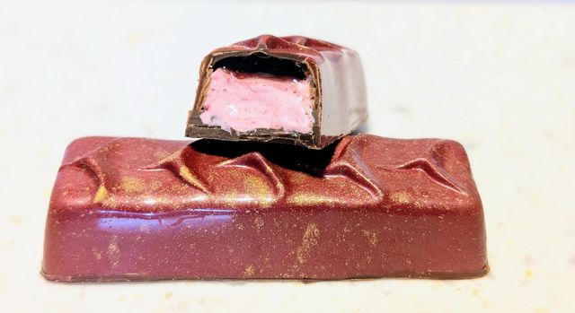 Dark Decedence. Dark chocolate filled with black cherry pâte de fruits and cherry marshmallow 