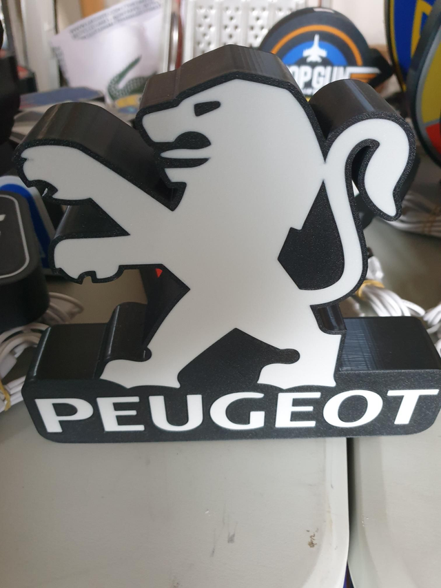 Lampe Peugeot ancien logo