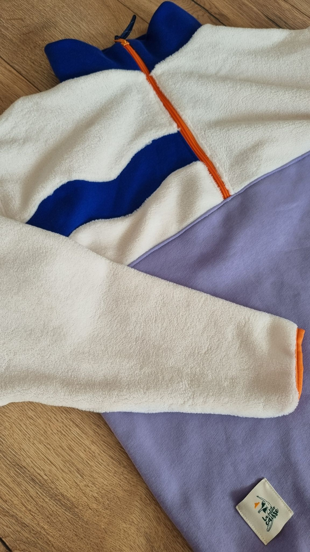 Pull polaire beige, lilas, bleu