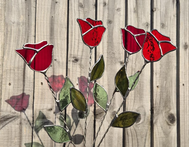 Stained glass roses with leaves on twisted wire stems