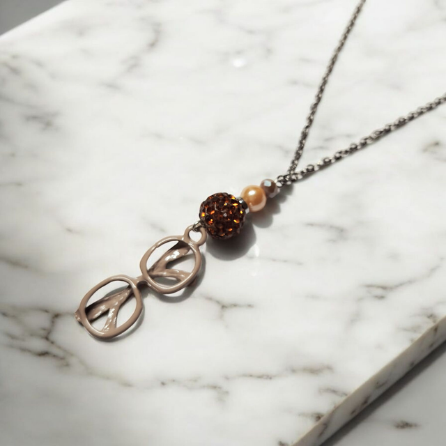 Collier acier inoxydable et cristal brun lunettes
