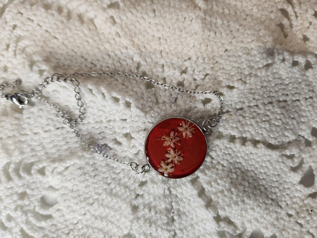 Bracelet fleurs séchées blanche fond rose