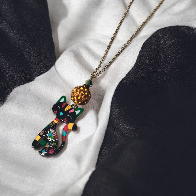 Collier acier inoxydable et cristal jaune et noir chat