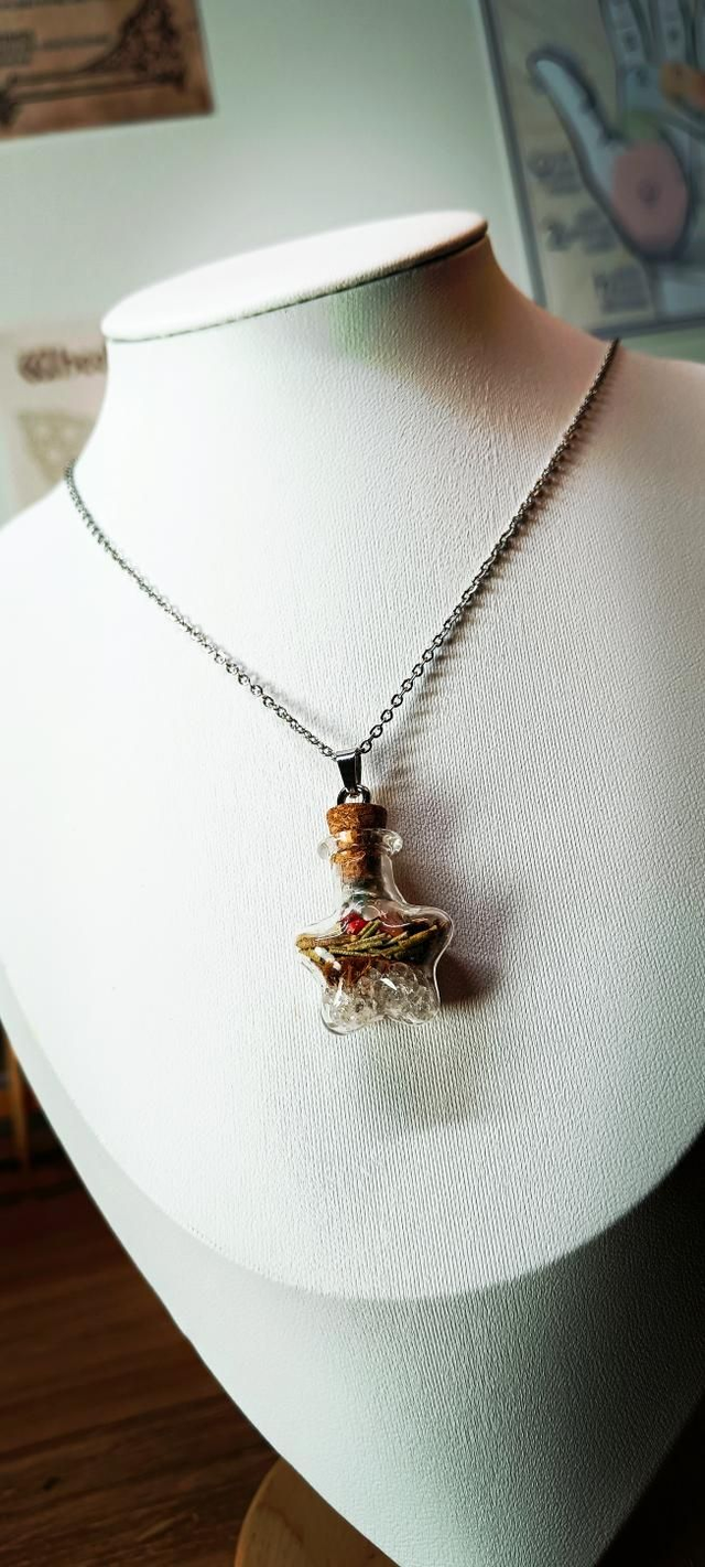 Pendentif Lumière dans l'obscurité argenté