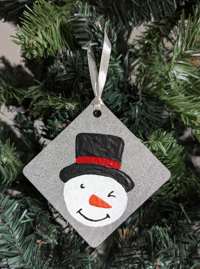 Tête bonhomme de neige 2024