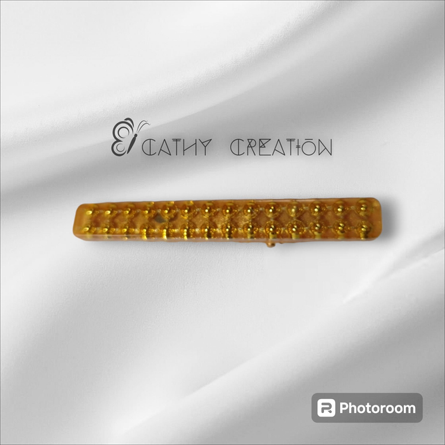 Pince à cheveux avec inclusion de perles 