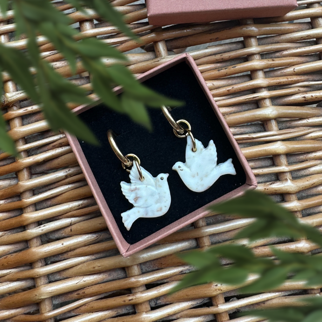 Colombes blanc moucheté