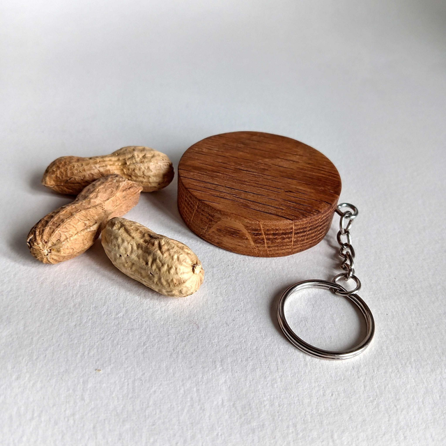 Décapsuleur porte clés rond