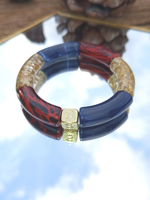 Bracelet jonc perles tubes acrylique léopard Indrani Laal Svarn