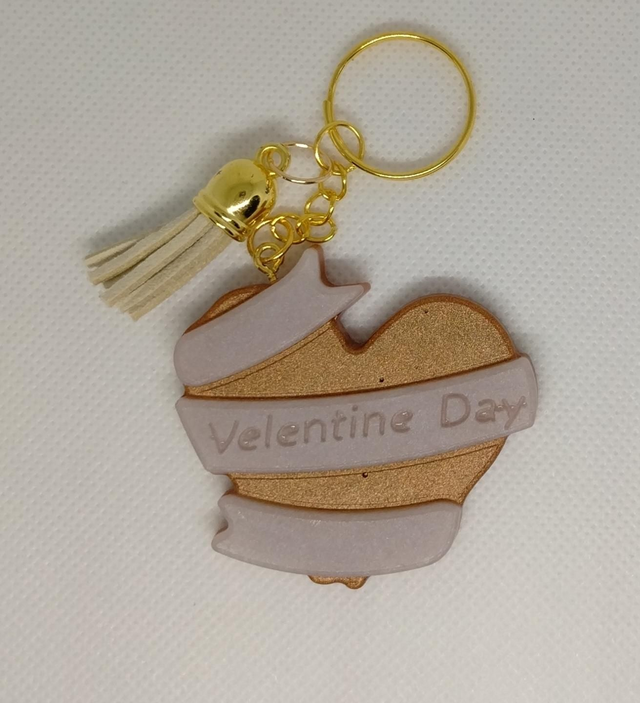 Porte clés doré et blanc 