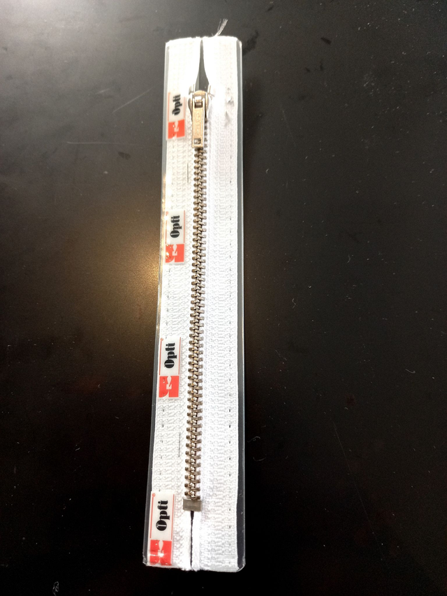 M40 / kleur 9 Opti Rits metaal (zilver)