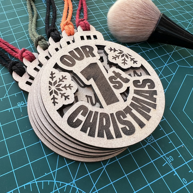 Wooden laser cut and hand finished “Our 1st Christmas” Bauble 