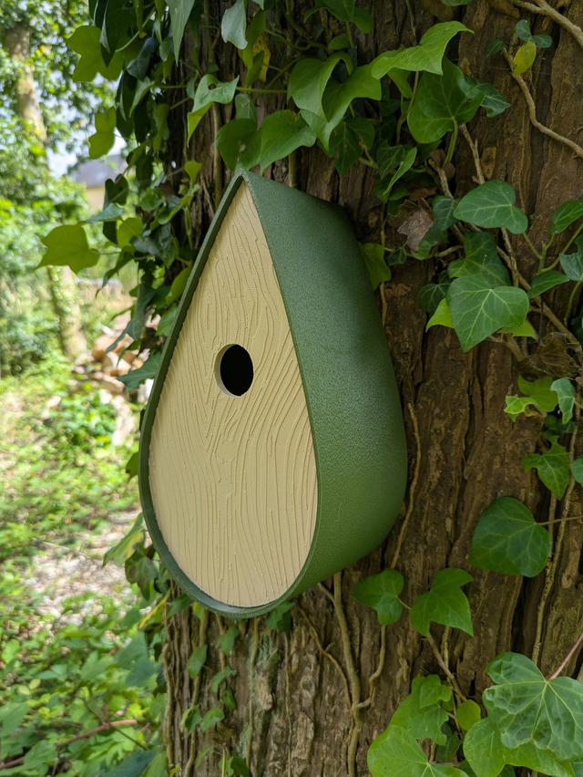 Nichoir bicolore à oiseaux de la nature en forme de goutte d'eau moderne effet bois