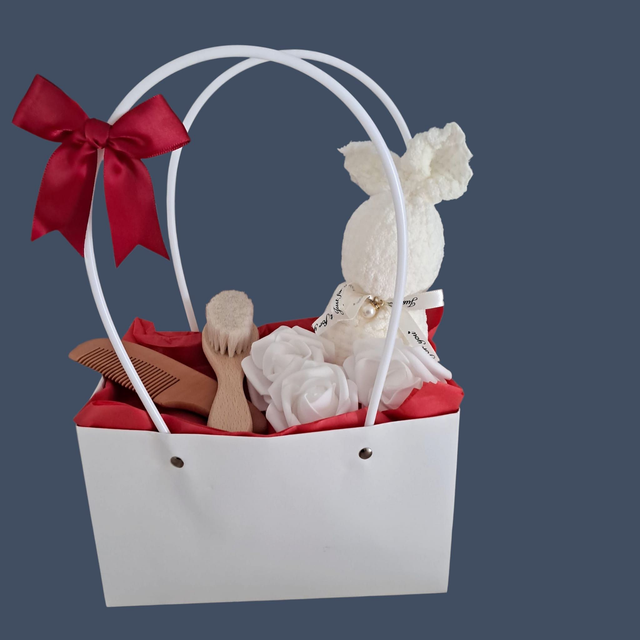 Sac de couches avec accessoires et serviette lapin