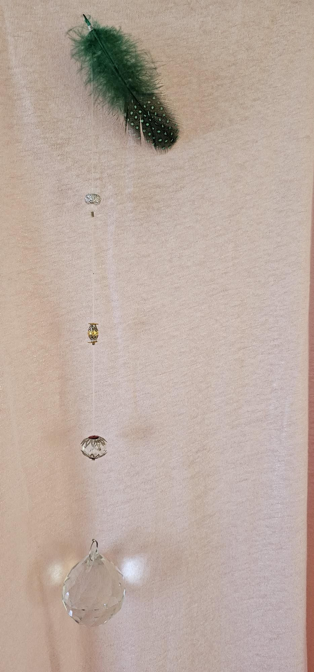 Attrape-soleil Plume verte – Création Vibratoire