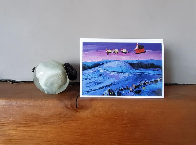 Father Christmas and his flying sheep over Castleton on the North York Moors, a6 card. 
