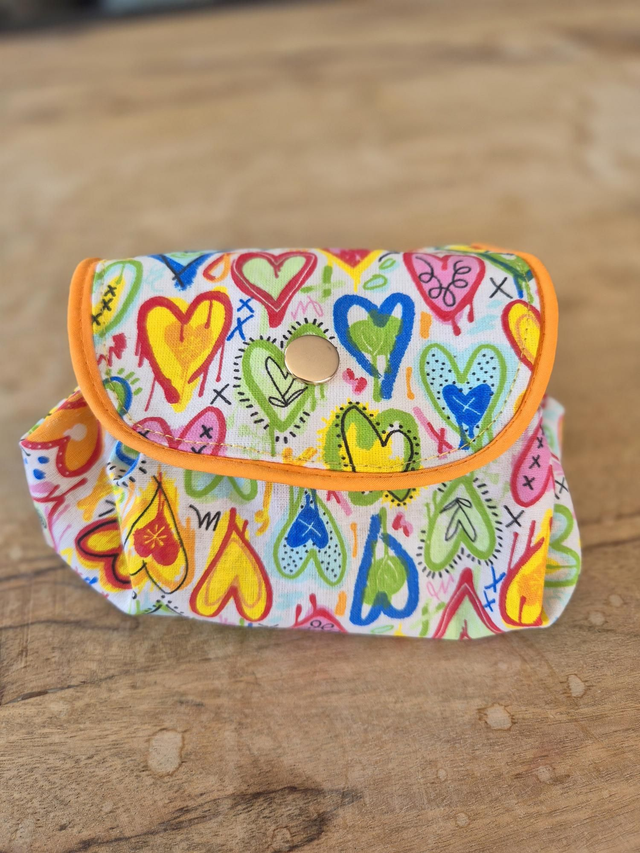 Trousse maquillage ronde cœurs
