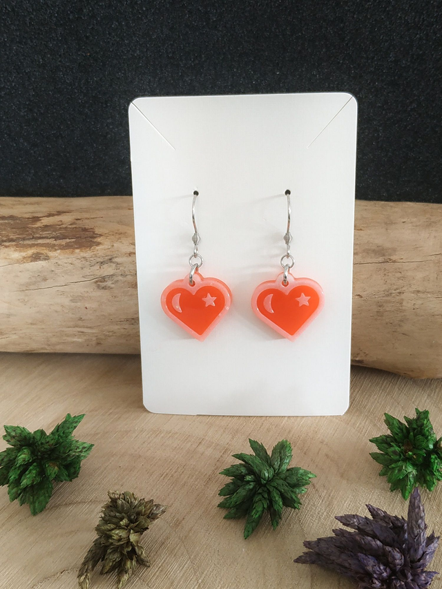 Boucles d'oreilles cœur orange étoilée