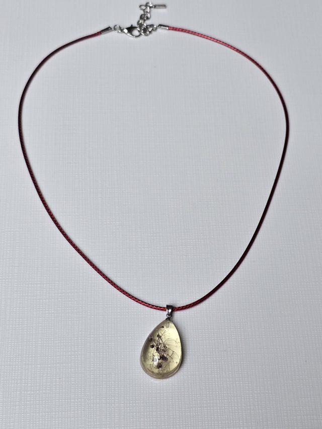 Necklace red waxed cord purple and white flowers in teardrop resin