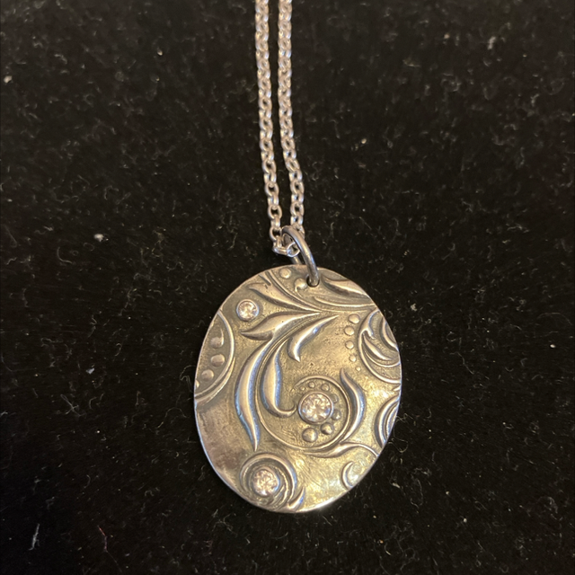 Swirls and sparkle pendant