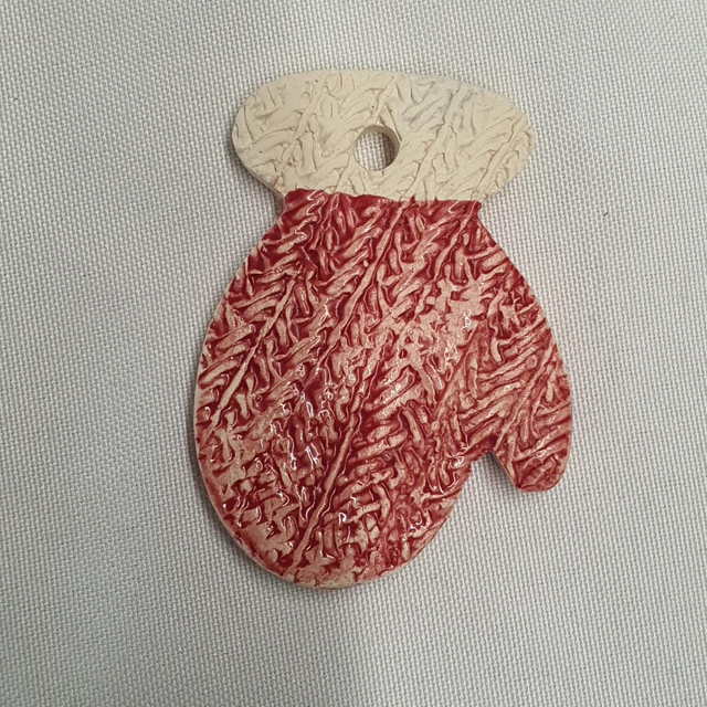 Knitted red &amp; white mitten decoration
