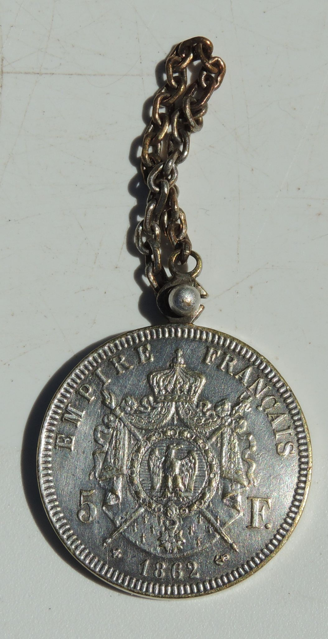 Porte-clés publicitaire ancien Orangina